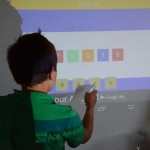 With the help of a youngster keen to grasp the English language, we got to see the Pond in use as a touch-enabled classroom whiteboard (Credit: Paul Ridden/Gizmag)